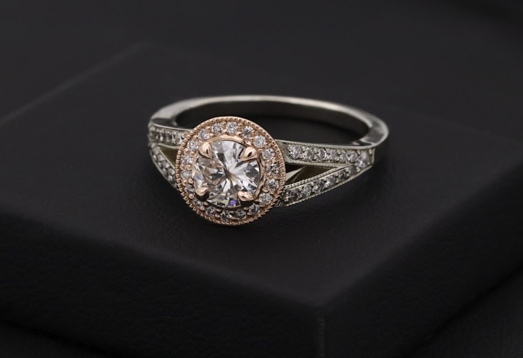 Solitaire diamond ring on a dark background — diamond jewellery website design